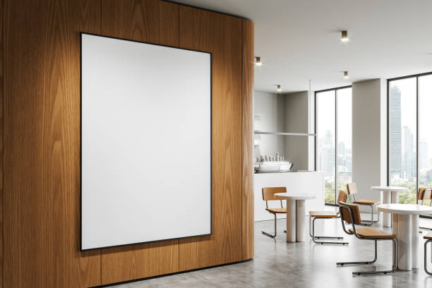 istock Blank poster mockup on wooden wall in modern cafe. 3D Rendering 2170782810