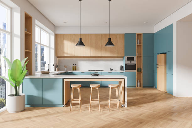 istock Modern kitchen interior with wooden cabinets and blue accents. 3D Rendering 2170782886
