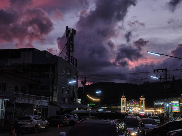 Dramatic skies meet the night market lights for a dark but beautiful atmosphere.