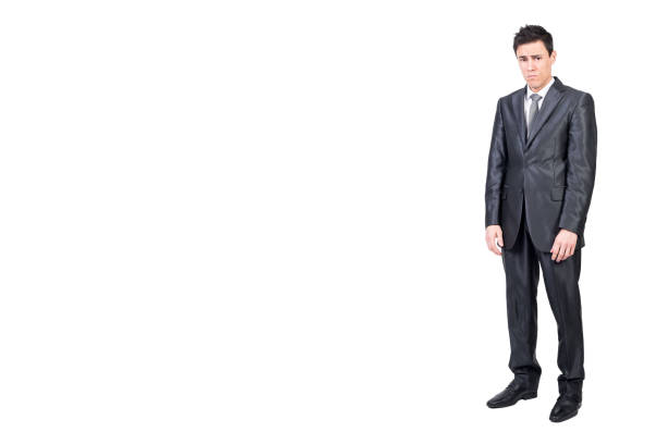 istock Upset young man in classy suit looking at camera 2170785911