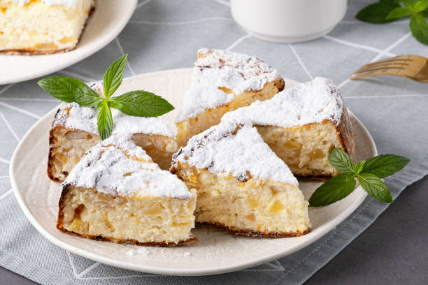 istock Appetizing cottage cheese casserole on white plate close up 2170788323