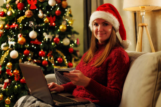 istock Woman shopping online with Christmas tree 2170790129