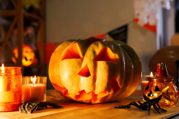 istock Carved pumpkin jack-o-lantern with candles for Halloween 2170790211