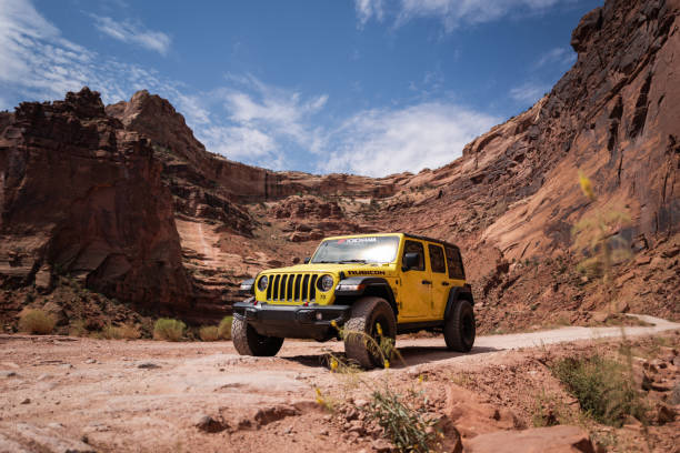 Moab, Utah, USA, July 5, 2024: Tourist driving the Shafer trail in canyonland National Park onboard of a Jeep car, on July 5, 2024 in Moab, Utah, USA