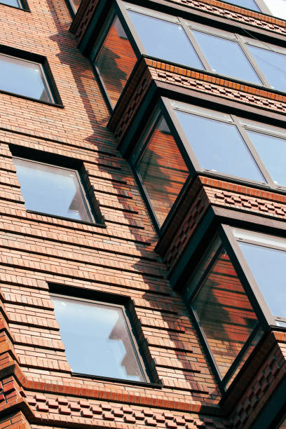 istock modern loft red brick exterior facade building architecture object vertical picture foreshortening with perspective from below 2170794218