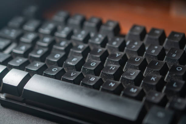istock Close-up of a Dusty Black Computer Keyboard 2170794796