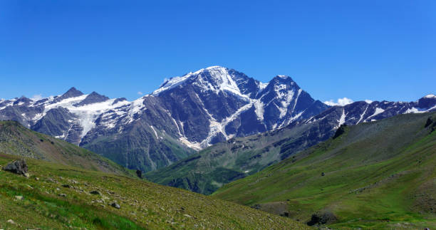 istock mountain landscape with slope with alpine weadows on a foreground 2170796045