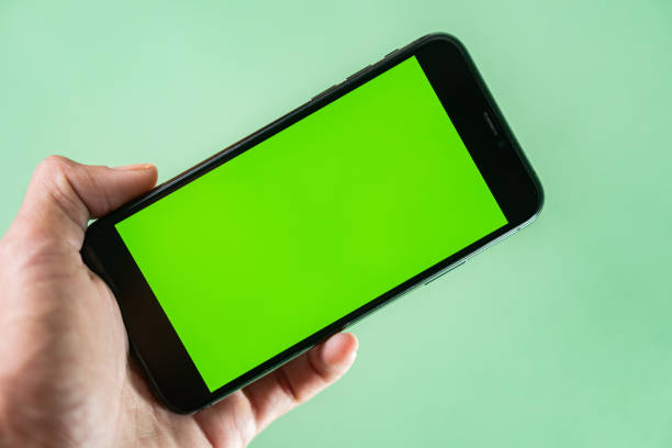 istock Smart phone with Green Screen in Hand 2170797759