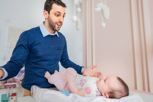 istock Father talking to daughter at home 2170798838