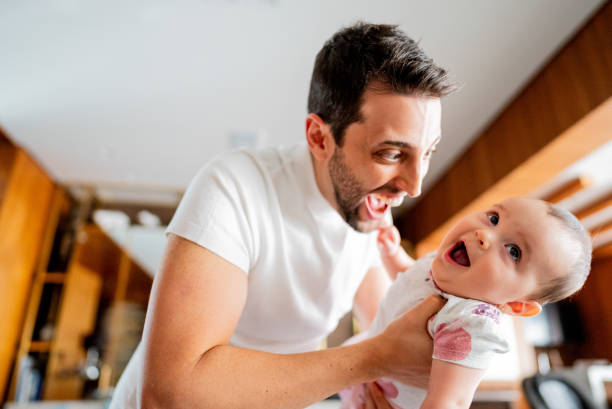 istock Father and daughter playing at home 2170798901