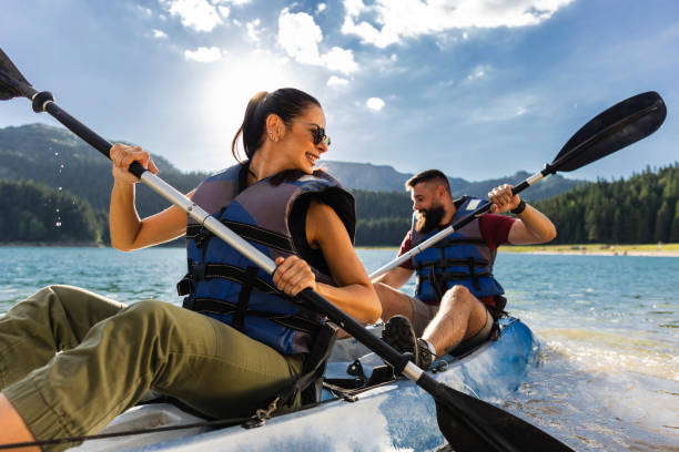 istock Couple Enjoying a Kayaking Adventure on a Mountain Lake 2170802932