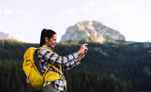 istock Woman Taking a Photo During Mountain Hike 2170802944