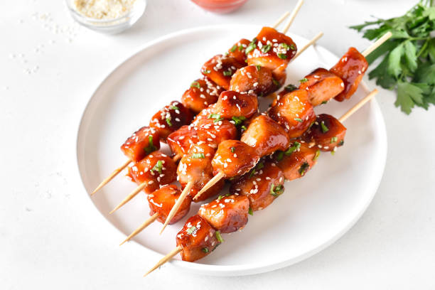 istock Teriyaki chicken skewers on plate 2170803099
