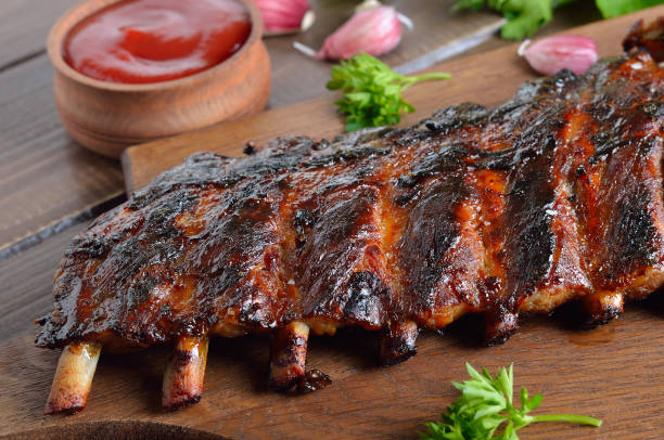 istock Spicy hot grilled spare ribs on cutting board 2170803832