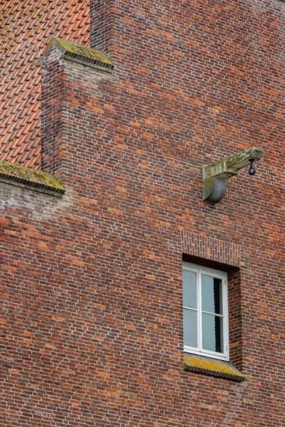 istock House gable with suspension for pulley block 2170804284