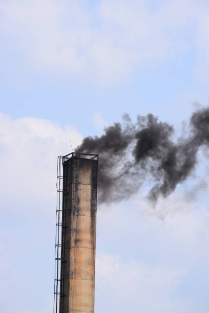 istock a chimney from which black smoke comes out - environmental pollution 2170804761