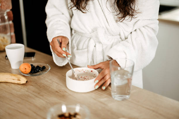 istock Woman having healthy breakfast 2170805065