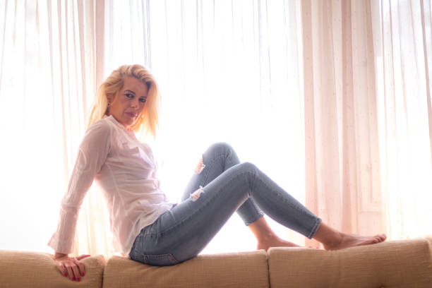 Lonely woman spending time at home