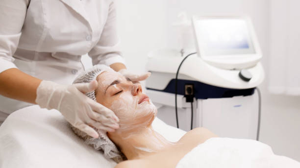 istock A skilled cosmetologist cleanses a young woman's face with specialized products in a modern beauty salon. This professional treatment promotes radiant skin and rejuvenates your beauty routine. 2170816321