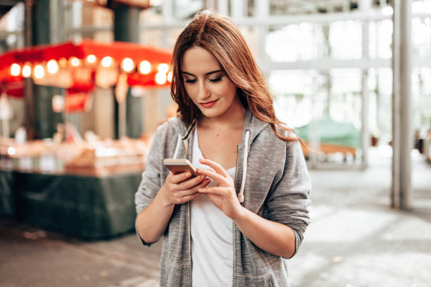 istock smiling woman at the market 2170816640