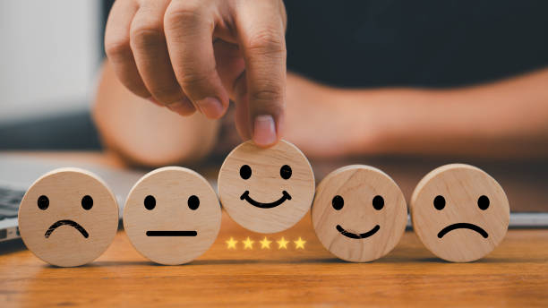 istock feedback rating and positive customer review experience, service and Satisfaction, Business people are Choosing wood block with 5 star icon to give satisfaction in service. rating very impressed. 2170817366