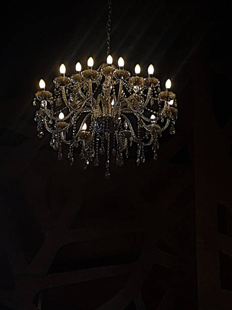 istock Crystal chandelier on black background 2170820264