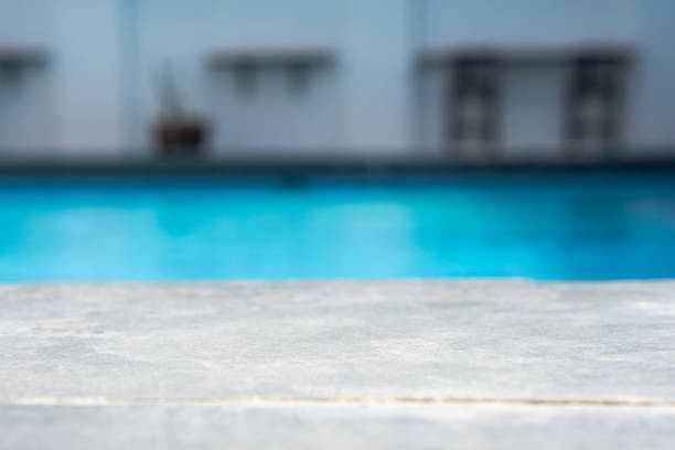 Resort Hotel Poolside with Sun Beds and Palm Trees. 3D Render