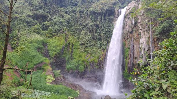 istock Beautifull Waterfall in Tropical Forest, Bengkulu, Indonesia Background Desktop 2170827336