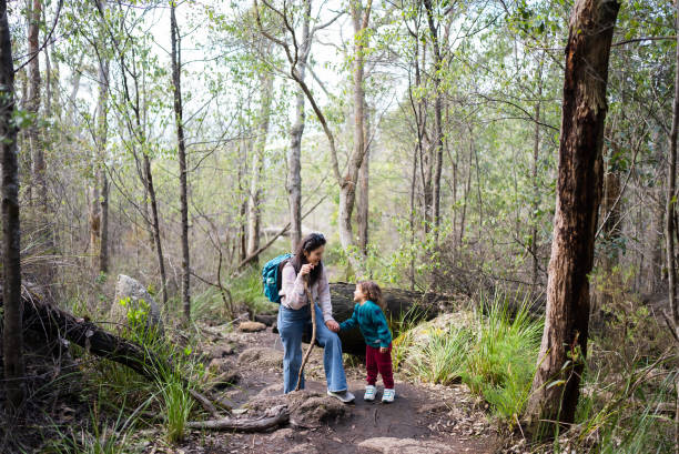 istock mother and son exploring nature together 2170828162
