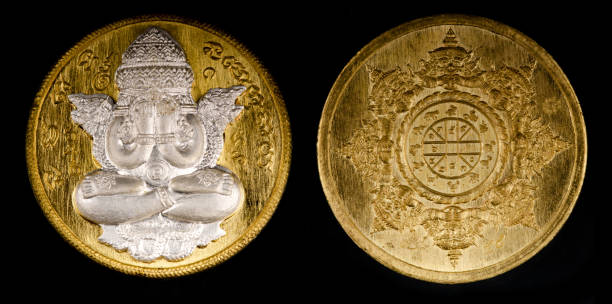 istock Amulets  sacred Thai amulets  gold frame  black background 2170828454