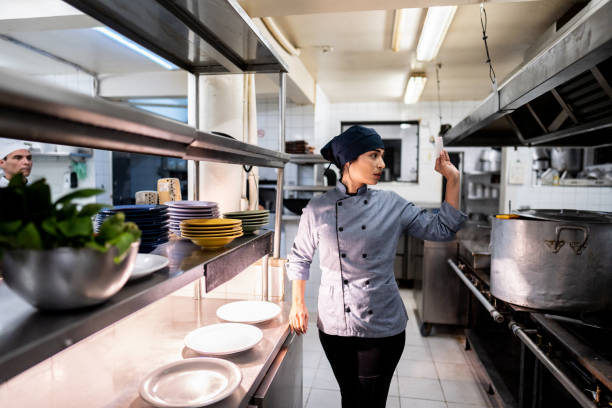 istock Chef talking about customer's order in a commercial kitchen 2170829839
