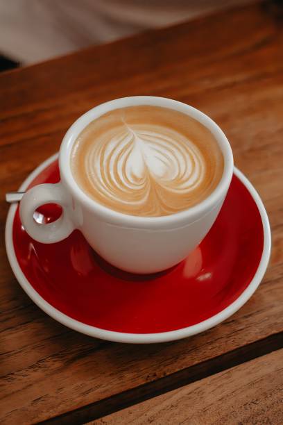 istock Cup of coffee in red dish 2170830573