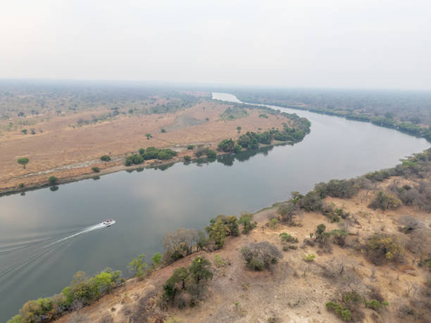 istock Serene Kafue River Cruise with Small Boat 2170832223