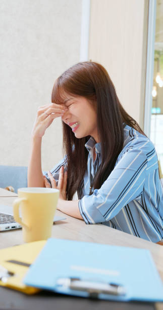 istock woman tired eye uncomfortable 2170833134