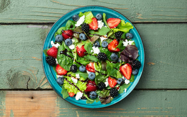 istock Berries salad (blueberry strawberry blackberry ) with cheese feta and balsamic sauce 2170833748