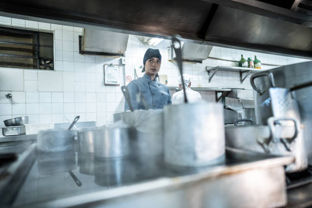 istock Chef cooking in a commercial kitchen 2170834810