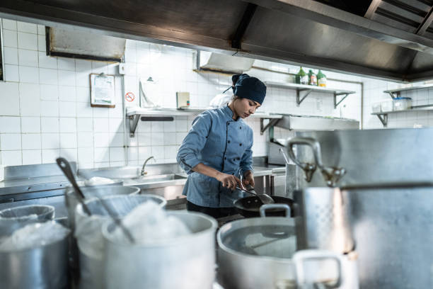 istock Chef cooking in a commercial kitchen 2170834820