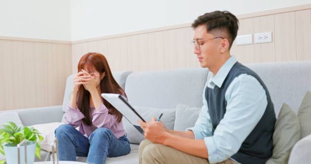 istock asian lady counseling and crying 2170834951