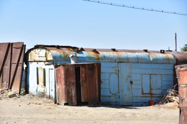 istock Rusting freight train cars in the desert at Aral, Kazakhstan 2170835565