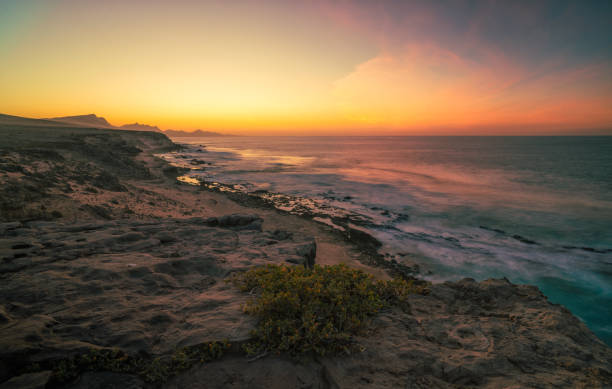 istock sunset at the sea with beautiful colors 2170835648