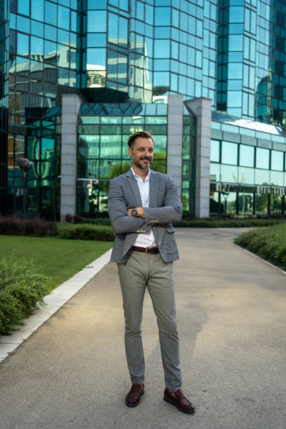 istock A businessman looking over the city and thinking. 2170835657