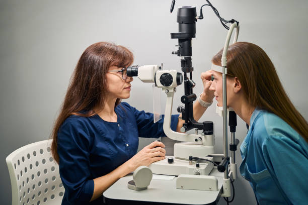 istock Female optometrist and patient during eye examination session 2170836740