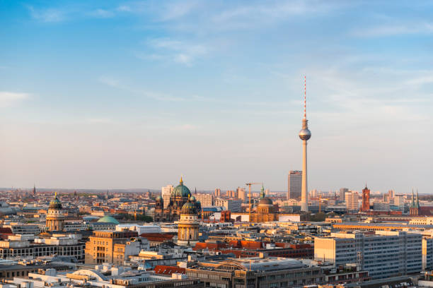 Horizontal aerial skyline image of Berlin during sunset moments.