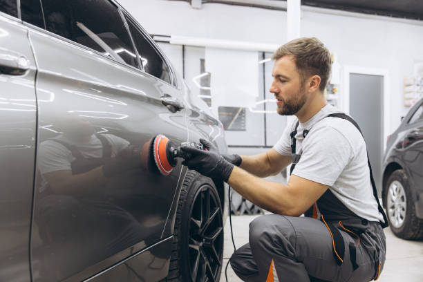 istock Professional Car Detailing with an Auto Polisher in a Garage Setting 2170837717