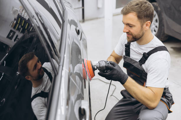 istock Professional Car Detailing with an Auto Polisher in a Garage Setting 2170837841