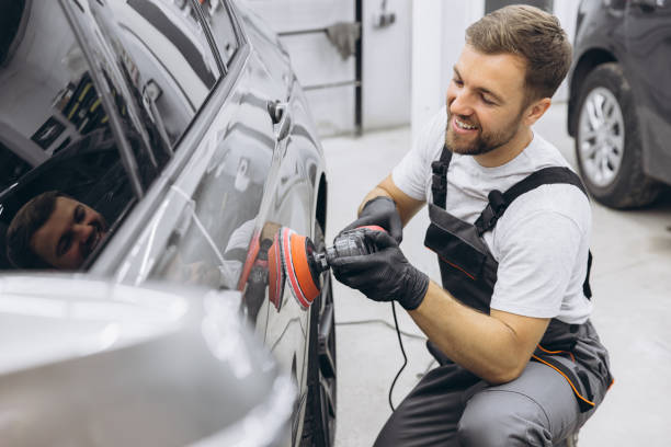 istock Professional Car Detailing with an Auto Polisher in a Garage Setting 2170837843