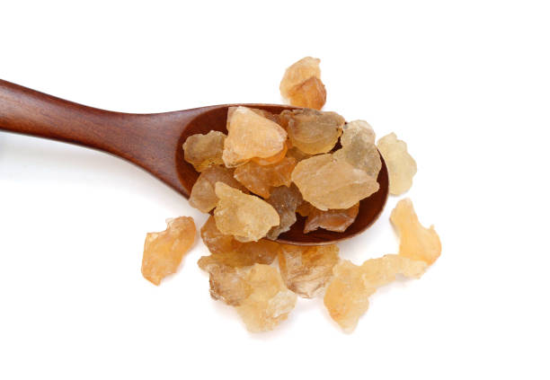 istock Brown sugar cubes isolated on white background 2170838594