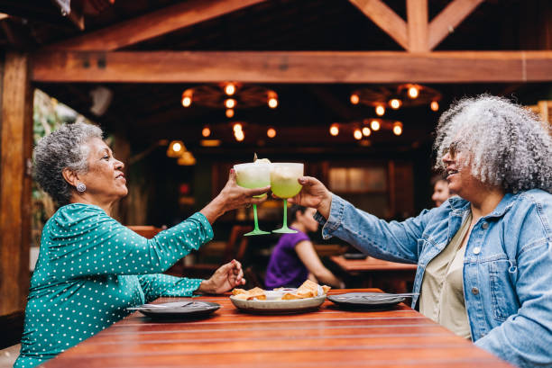 istock Friends toasting at restaurant 2170838605