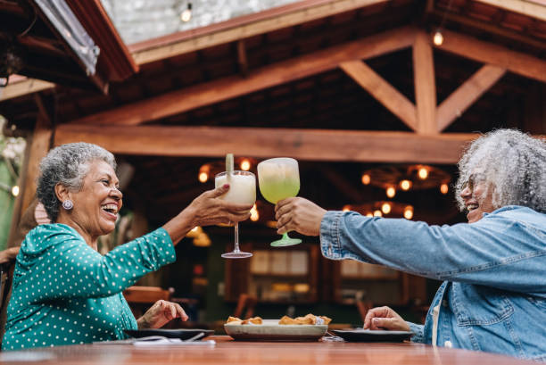 istock Female friends toasting at restaurant 2170838721