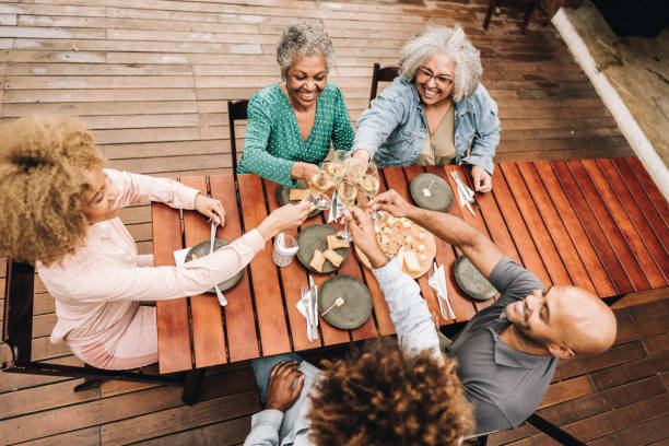 istock Friends toasting at restaurant 2170840614